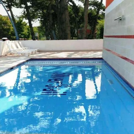 Relax And Unwind By The Pool In